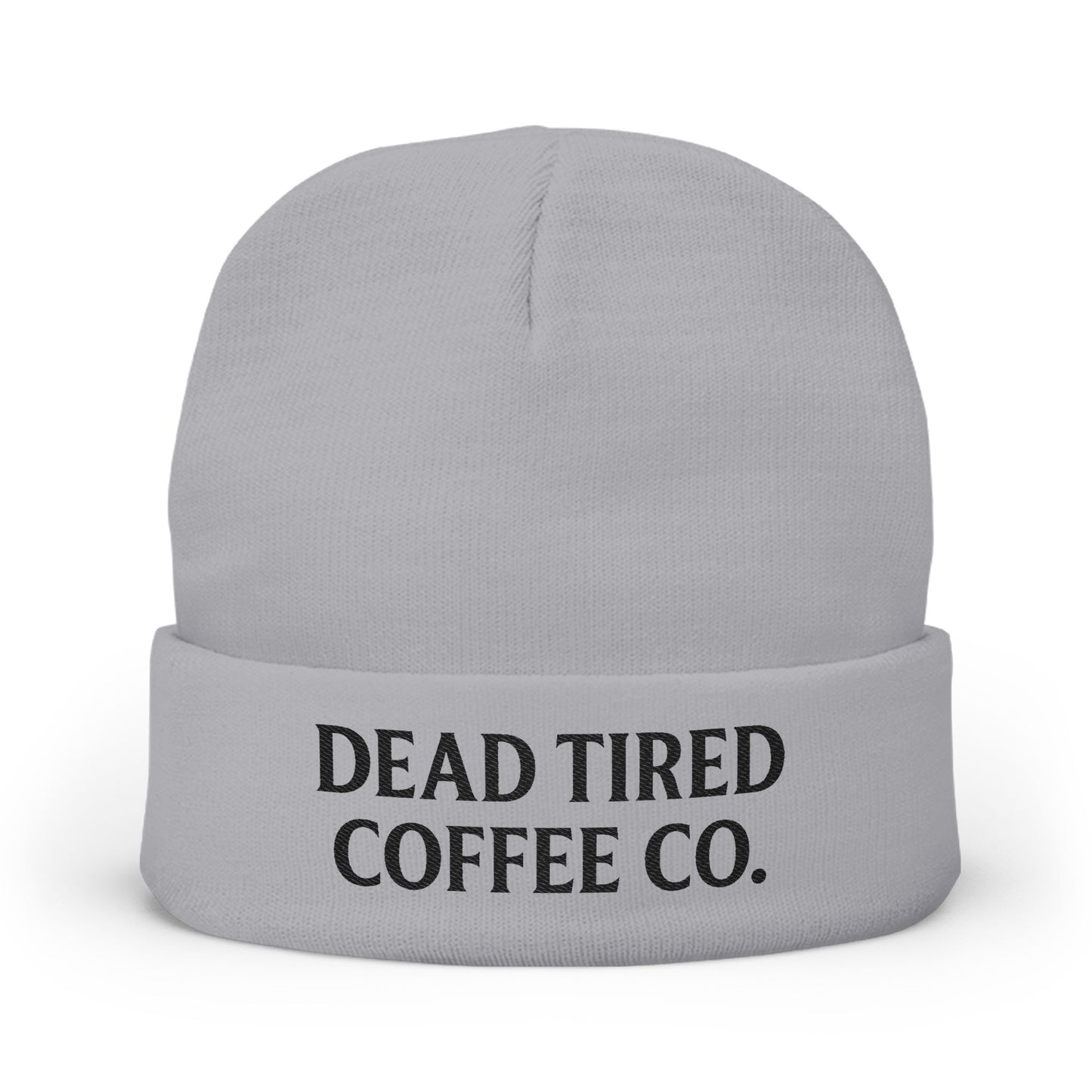 Gray beanie with 'DEAD TIRED COFFEE CO.' text on a white background
